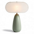 Ceramic table lamp in green with linen shade and 30 x 15 x 45cm dimensions